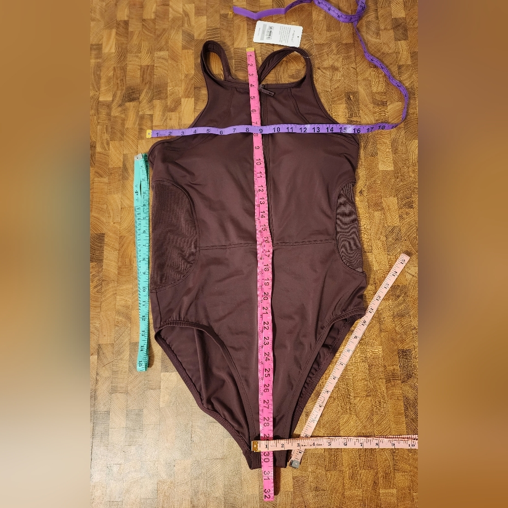 Syrokan one piece zip front swimsuit with built in bra and mesh sides INT'L 40